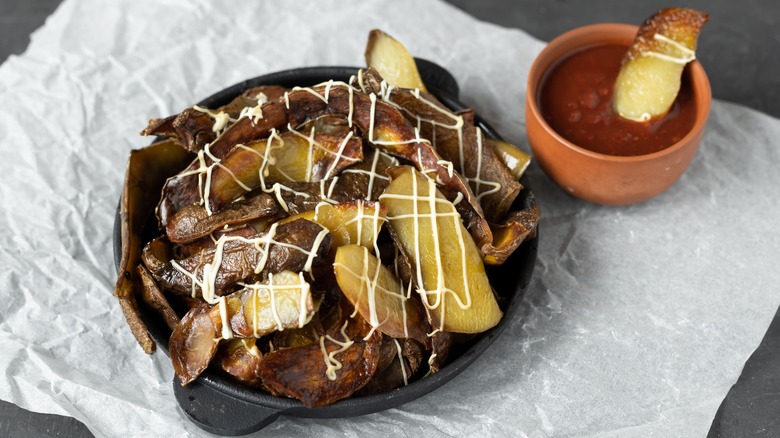 Potato skin nachos in skillet