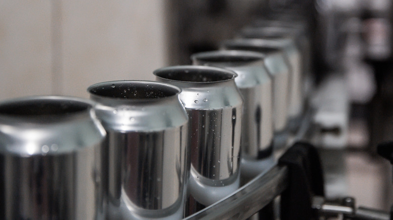 Cans on assembly line