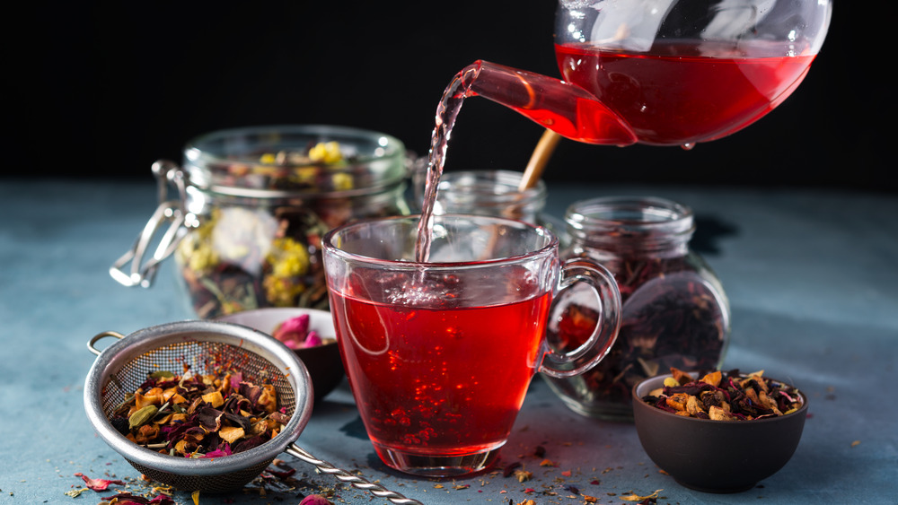 Tea being poured into cup