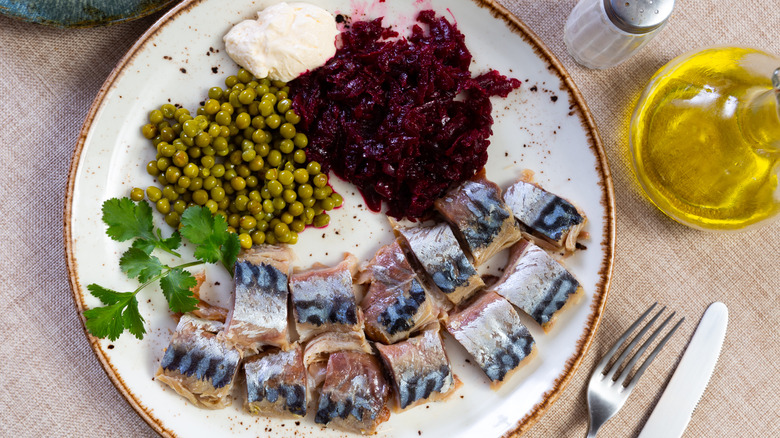 Plated tinned herring and sides