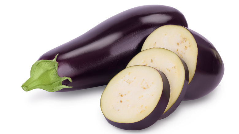 Whole and sliced eggplant