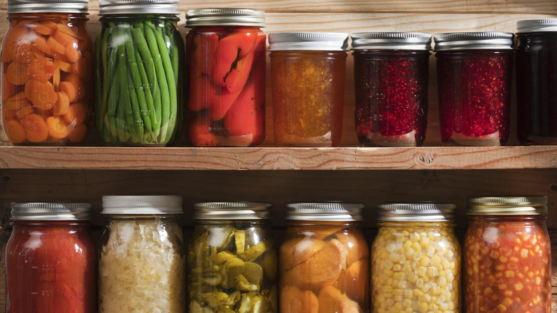 Shelves stocked with canned goods