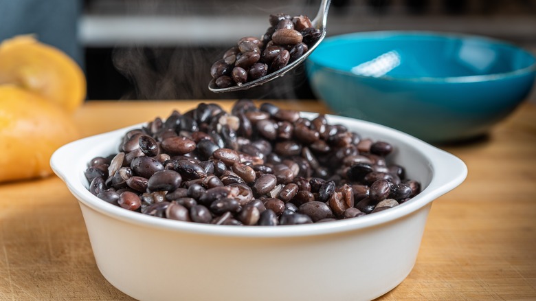 spoon and black beans