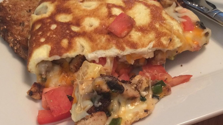 Chicken omelette with tomatoes