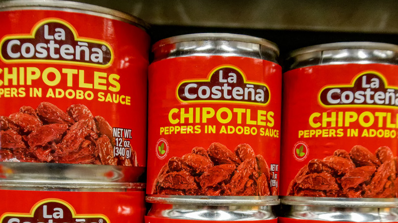 Cans of chipotle peppers in adobo sauce