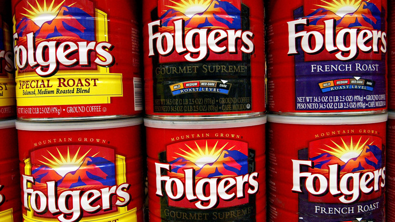 Cans of Folgers coffee