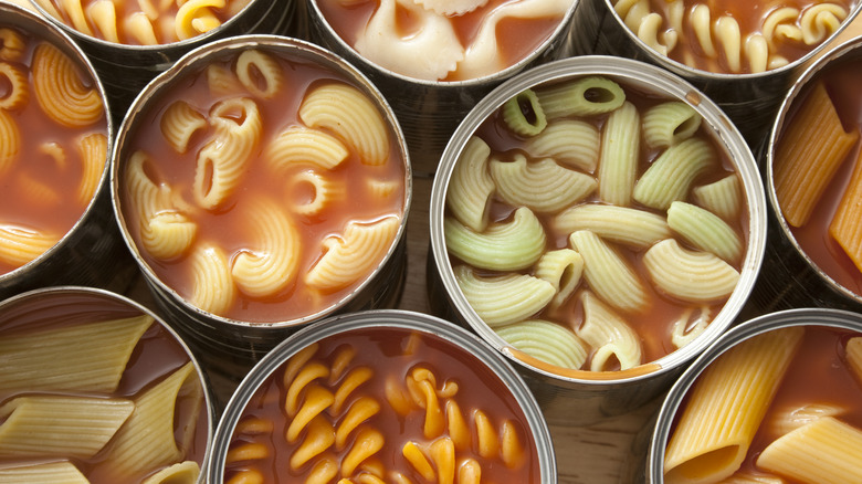 assorted open pasta cans