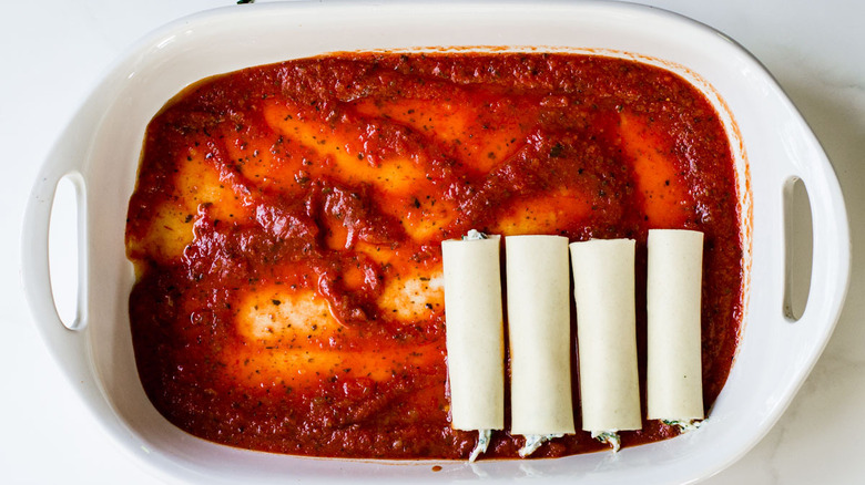 stuffed pasta tubes in sauce