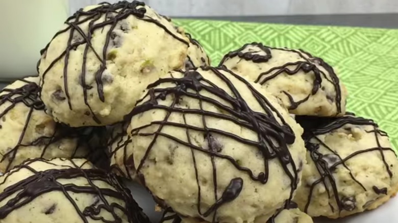 pile of chocolate-drizzled cookies 