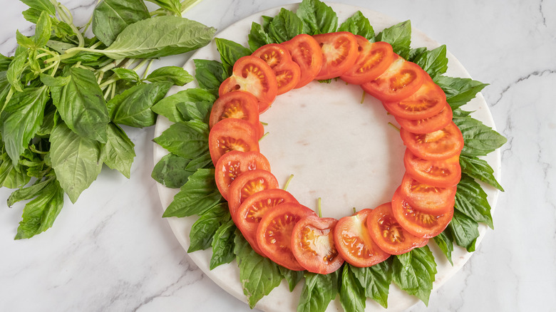 sliced tomatoes and basil