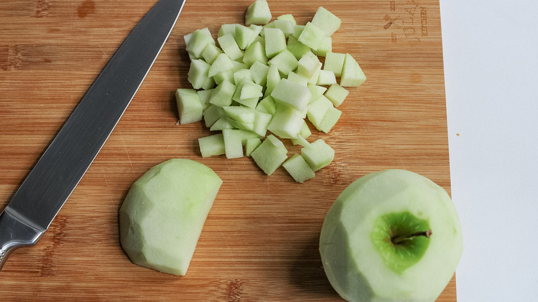 Chopped apples on cutting board