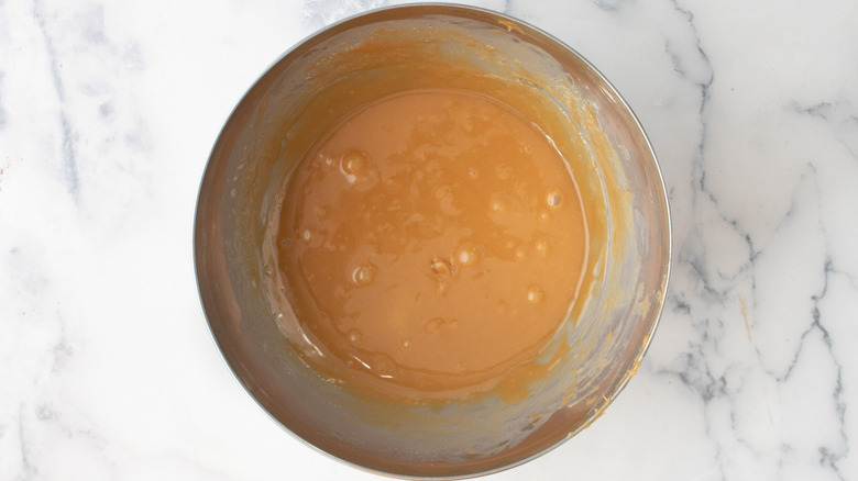 melted caramel candy in pot