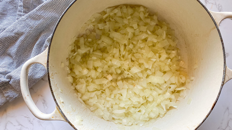 chopped onions in pot