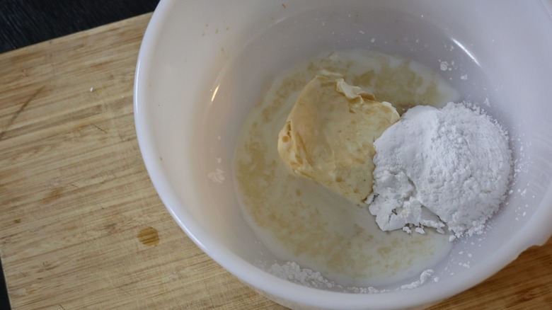 bowl of cream cheese glaze ingredients