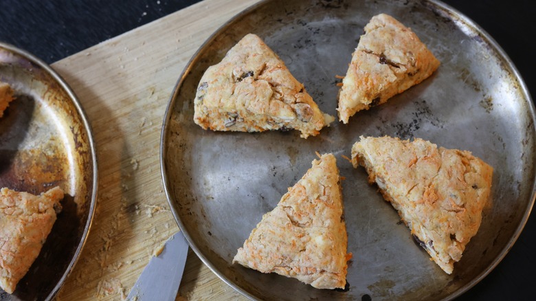 raw scones on baking sheet