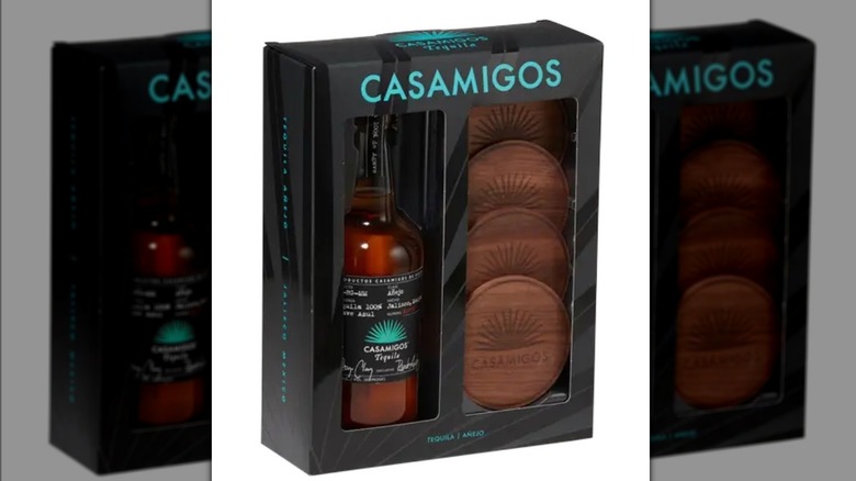 Box containing Casamigos añejo and coasters