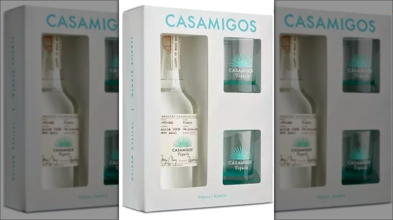 Box containing tequila blanco and rocks glasses