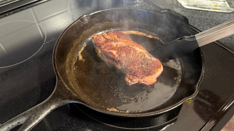 cooking steak in cast iron