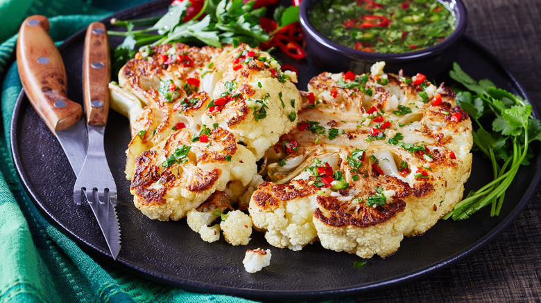 cauliflower steaks knife and fork