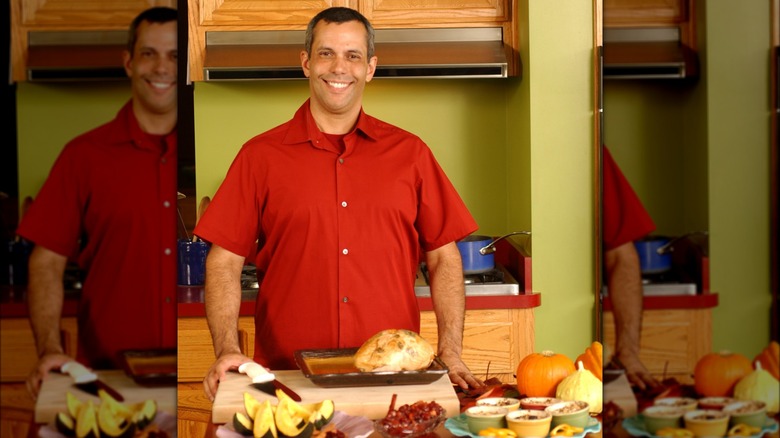 Juan-Carlos Cruz smiling with food