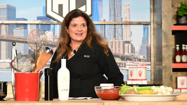 Alex Guarnaschelli cooking on stage