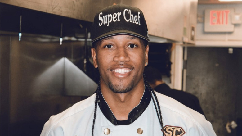 Darnell Ferguson in chef's coat and Super Chef hat