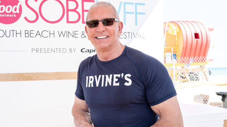 Robert Irvine smiles