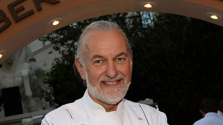 Hubert Keller poses in chef coat