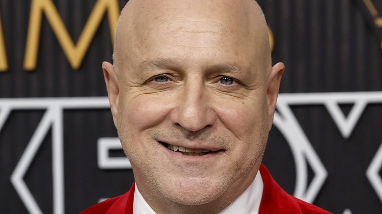 Tom Colicchio in red jacket