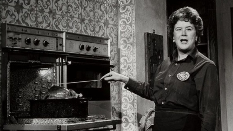 Julia Child roasting a turkey