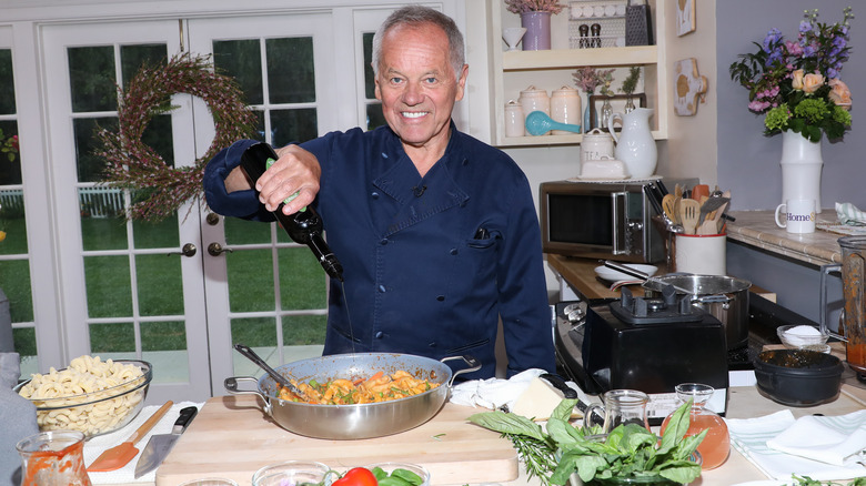 Wolfgang Puck cooking in the kitchen