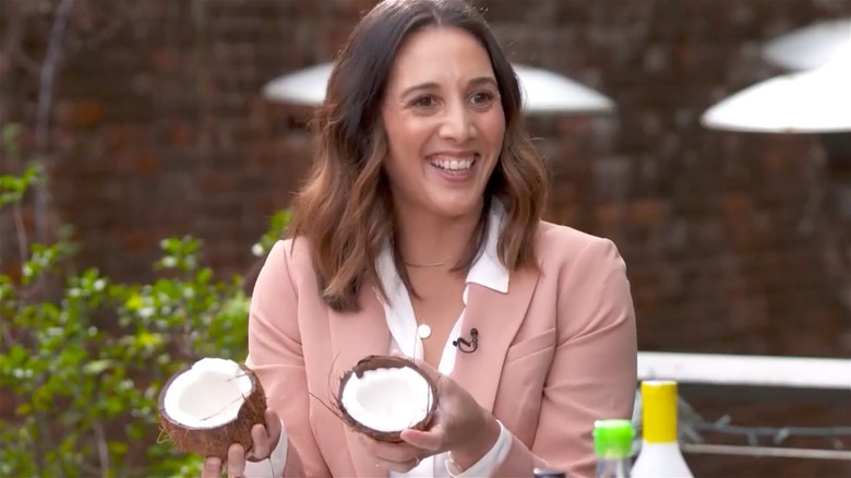 Leah Cohen holding coconut