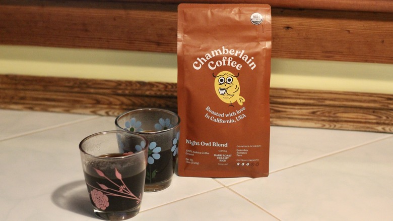 Bag of Chamberlain Night Owl coffee witih two glasses