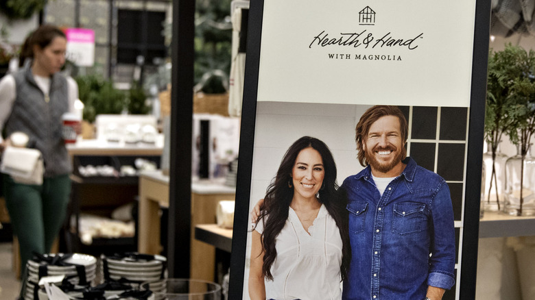 Chip and Joanna Gaines on a sign