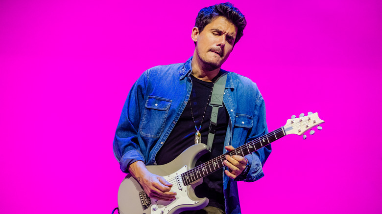 John Mayer playing guitar 