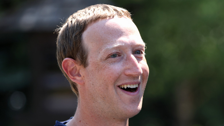 Mark Zuckerberg smiling big