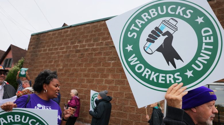 protesters outside starbucks store