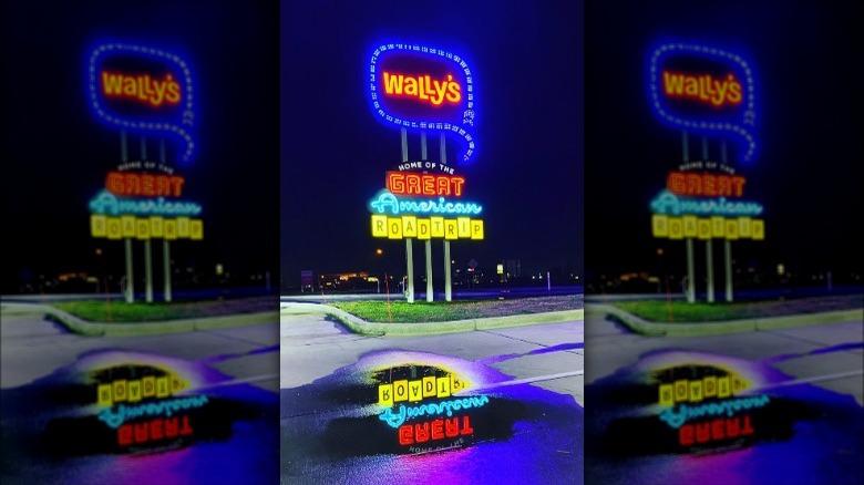 Wally's neon sign at night