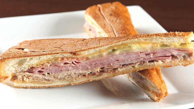 sliced Cuban sandwich on plate