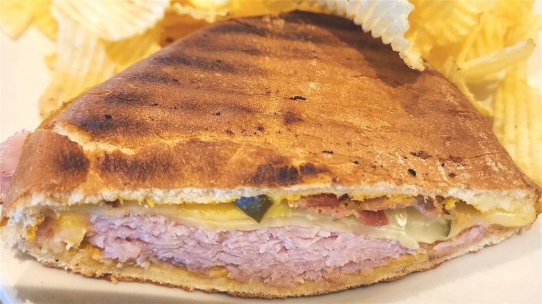 toasted Cuban sandwich with chips