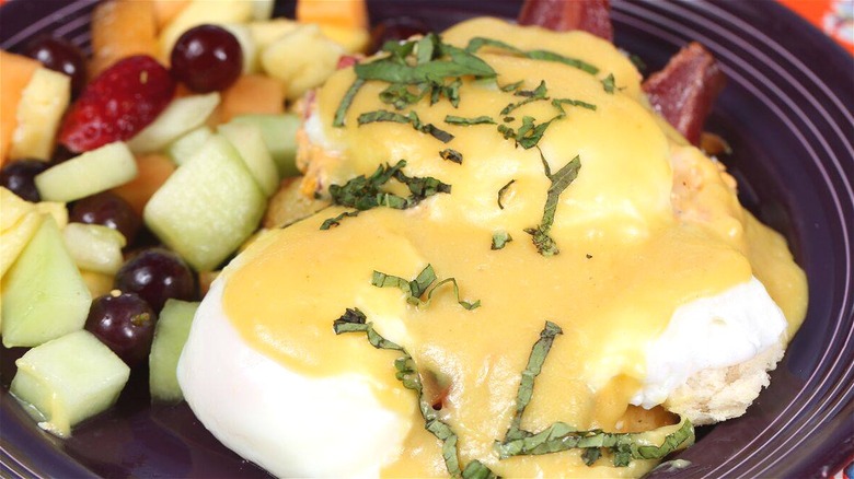 Eggs Benedict fresh fruit side