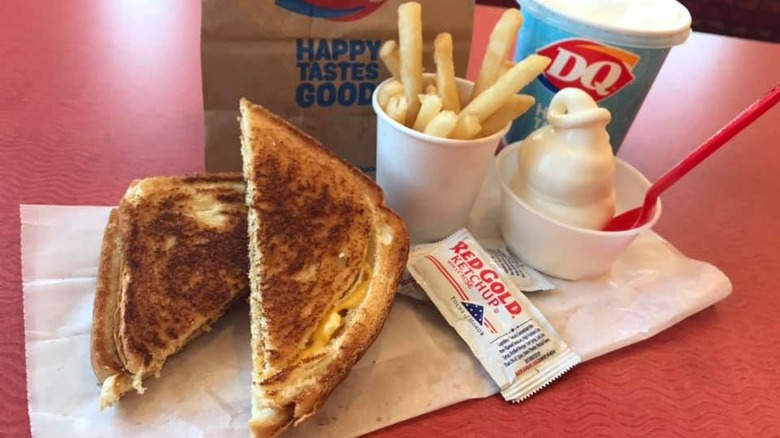 Dairy Queen grilled cheese meal with fries and soft serve and a drink 