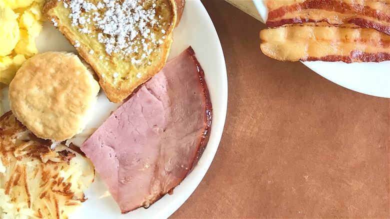 Breakfast ham on white plate