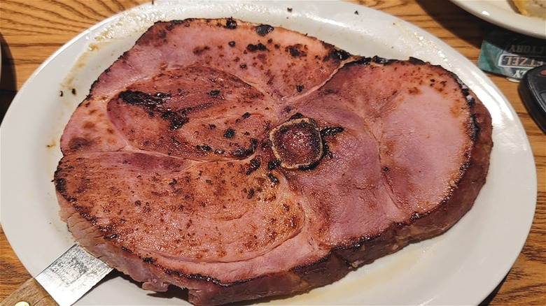 Country ham on white plate