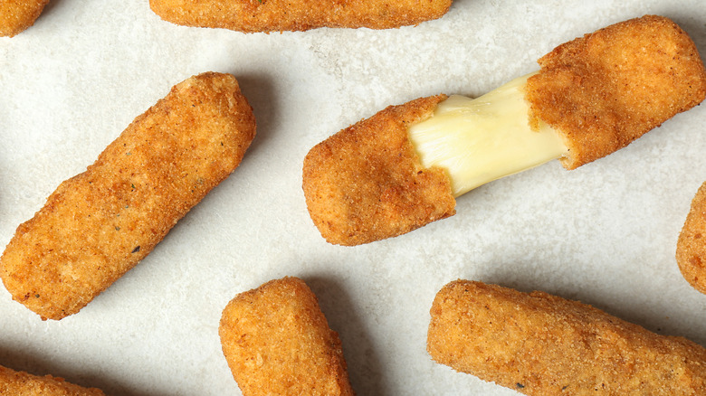 Mozzarella sticks on silver tray