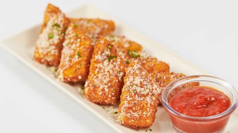 Mozzarella sticks garnished with Parmesan