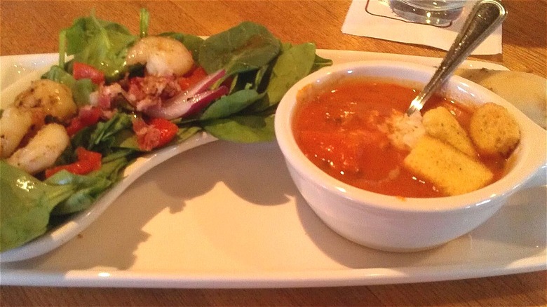 Tomato soup with salad