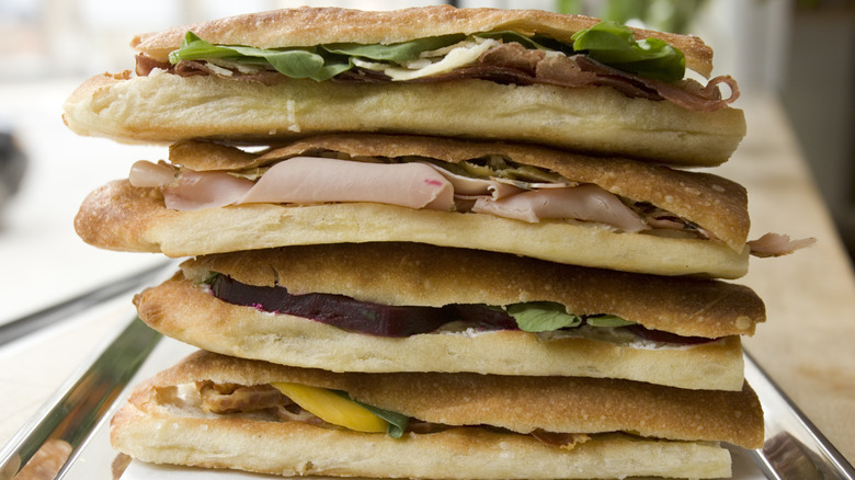 Stack of sub sandwiches