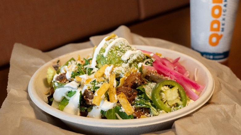 QDoba burrito bowl with a drink