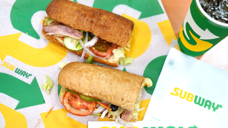 A pair of Subway sandwiches